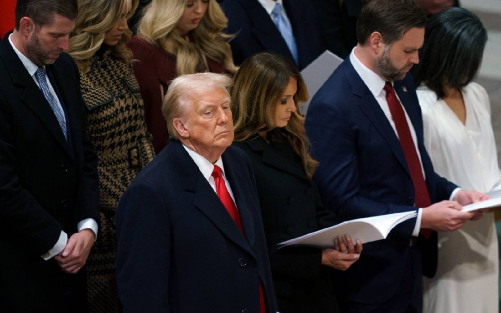 Cover Image for Bishop lectures stony-faced Trump in church