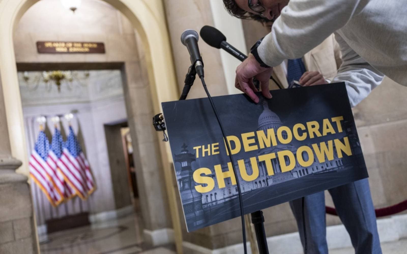 Cover Image for Trump warns workers sent home in US shutdown may lose back pay