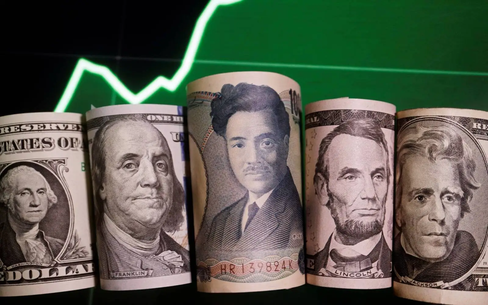 Cover Image for Yen slumps, dollar jumps as rate cut bets recede