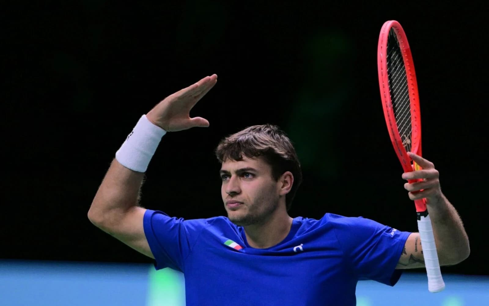 Cover Image for Battling Cobolli sends holders Italy into Davis Cup final